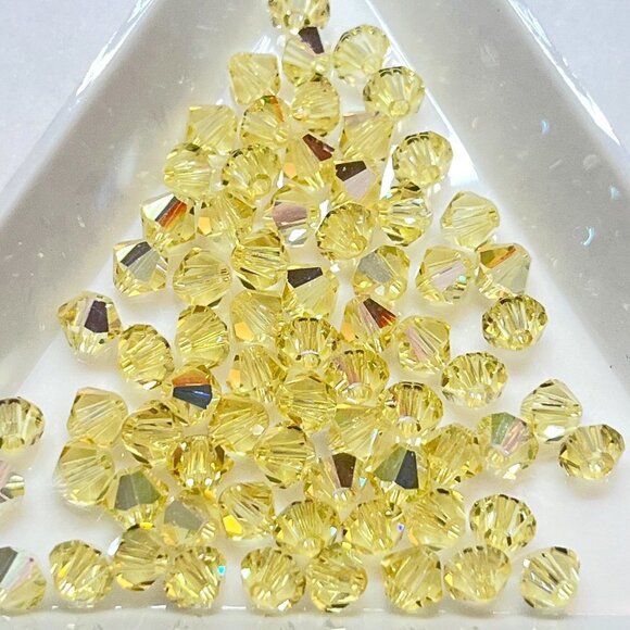 As Low As $2 4mm Jonquil AB Swarovski Crystal Bicone 5301 Beads 20pcs - Picture 2 of 4